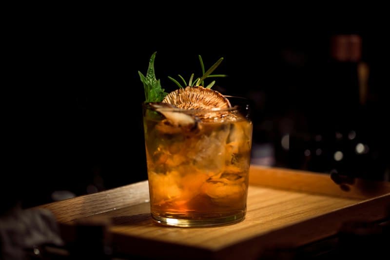 Refreshing drinks on a bar counter at an evening social